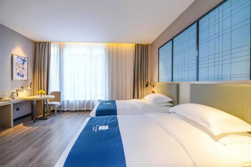Echarm Hotel Ji'Nan Railway Station Jinan Esterno foto